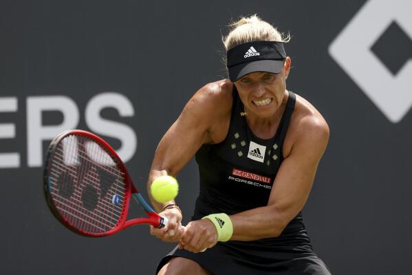 Germany's Angelique Kerber returns the ball to Russia's Anastasia Gasanova during their WTA Bad Homburg tournament tennis match, in Bad Homburg, Germany, Tuesday, June 21, 2022.  (Joaquim Ferreira/dpa via AP)