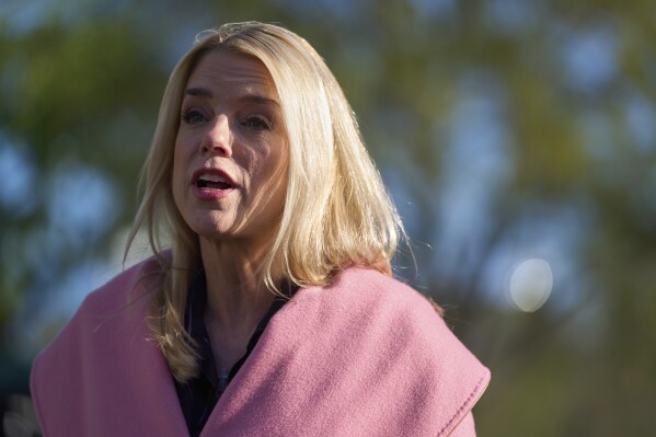 Attorney General Pam Bondi speaks with reporters at the White House, Tuesday, April 8, 2025, in Washington. (AP Photo/Evan Vucci)
