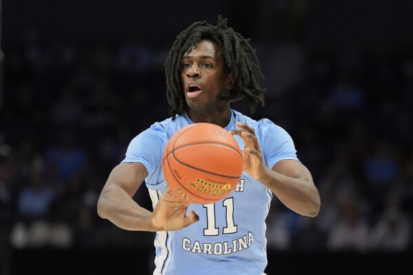 North Carolina guard Ian Jackson brings the ball down court during the first half of an NCAA college basketball game against Wake Forest in the quarterfinals of the Atlantic Coast Conference tournament, March 13, 2025, in Charlotte, N.C. (AP Photo/Chris Carlson, File)