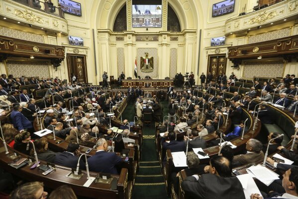 
              Egypt's Parliament meets to deliberate over constitutional amendments that could allow President Abdel-Fattah el-Sissi to stay in office till 2034, in Cairo Egypt, Wednesday, Feb 13, 2019. Wednesday's session will lead to a vote later in the evening or on Thursday, after which the text of the amendments would be finalized by a special committee for a final decision within two months. El-Sissi's current second term expires in 2022. (AP Photo)
            