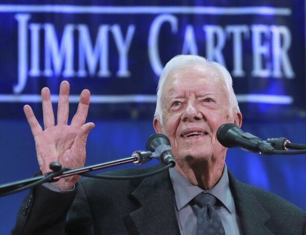 
              Former President Jimmy Carter, 93, answers questions from students during his annual town hall with Emory University freshmen in the campus gym on Wednesday, Sept 12, 2018, in Atlanta. Speaking at his presidential center in Atlanta on Tuesday, Carter said U.S. policies on immigration, the environment and human rights will not improve while Trump is in office. (Curtis Compton/Atlanta Journal-Constitution via AP)
            