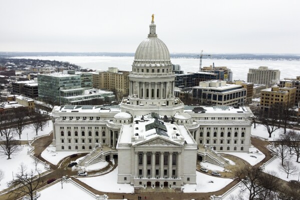 FILE - This image taken with a drone shows the Wisconsin State Capitol on Dec. 31, 2020, in Madison, Wis. Measures that would legalize medical marijuana, spend $125 million to combat pollution from “forever chemicals” and allow election officials to speed up the counting of absentee ballots all appear to be doomed as the Wisconsin Legislature plans to meet for a last time on Thursday, Feb. 22, 2024. (AP Photo/Morry Gash, file)