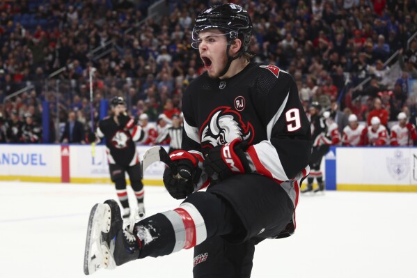 Buffalo Sabres left wing Zach Benson (9) celebrates his goal during the first period of an NHL hockey game against the Detroit Red Wings Tuesday, March 12, 2024, in Buffalo, N.Y. (AP Photo/Jeffrey T. Barnes)