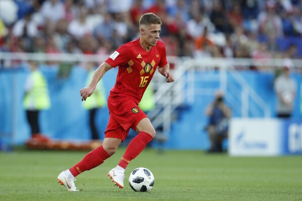 FILE - Belgium's Thorgan Hazard runs with the ball during the group G match between England and Belgium at the 2018 soccer World Cup in the Kaliningrad Stadium in Kaliningrad, Russia, on June 28, 2018. After scoring for Anderlecht in the Belgian league Sunday Feb. 18, 2024 Hazard celebrated his goal by mimicking a bird flapping his wings. Anderlecht struggled against Sint-Truidense and trailed until the 49th minute when Hazard put the teams level with a header. (AP Photo/Hassan Ammar, File)