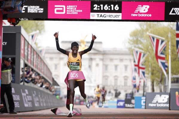 Peres Jepchirchir of Kenya crosses the finish line to win the women's race at the London Marathon in London, Sunday, April 21, 2024.(AP Photo/David Cliff)