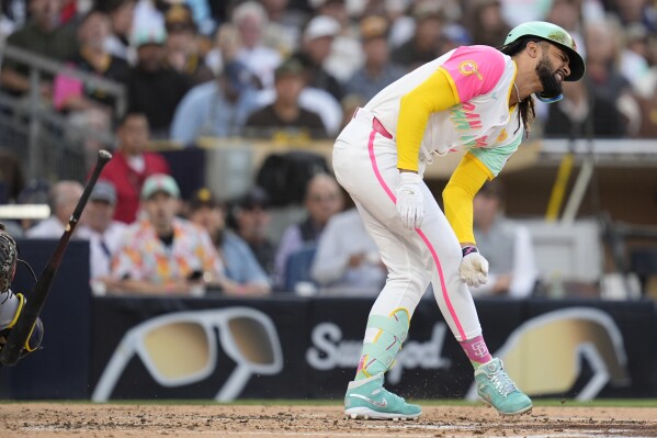 Padres star Fernando Tatis Jr. placed on injured list with stress reaction  in his right thigh bone | AP News