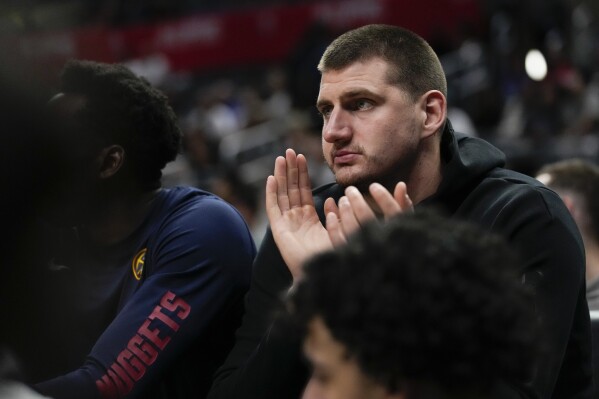 Jokic and the Nuggets gear up for road ahead as they try to defend
