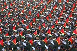 
              FILE - In this Sept. 21, 2016 file photo, Iran's Revolutionary Guard troops march in a military parade marking the 36th anniversary of Iraq's 1980 invasion of Iran, in front of the shrine of late revolutionary founder Ayatollah Khomeini, just outside Tehran, Iran. The Trump administration is preparing to designate Iran’s Revolutionary Guards Corps a “foreign terrorist organization” in an unprecedented move that could have widespread implications for U.S. personnel and policy. U.S. Officials say an announcement could come as early as Monday, April 8, 2019, following a months-long escalation in the administration’s rhetoric against Iran. The move would be the first such designation by any U.S. administration of an entire foreign government entity.  (AP Photo/Ebrahim Noroozi, File)
            
