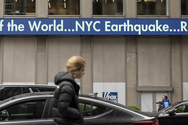 A display shows the news about an earthquake in New York City at News Corp Headquarters, Friday, April 5, 2024, in New York. An earthquake centered between New York and Philadelphia shook skyscrapers and suburbs across the northeastern U.S. Friday, causing no major damage but startling millions of people in an area unaccustomed to such tremors. (AP Photo/Yuki Iwamura)