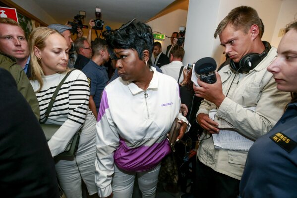 Renee Black returns to the district court in Stockholm after lunch, where her son Rakim Mayers, US rapper A$AP Rocky is appearing on charges of assault, in Stockholm, Sweden, Tuesday July 30, 2019.  American rapper A$AP Rocky and two other men believed to be members of his entourage went on trial Tuesday in Sweden in a high-profile legal case that has caught the attention of U.S. President Donald Trump and rallied music and entertainment celebrities among others. (Fredrik Persson/TT via AP)