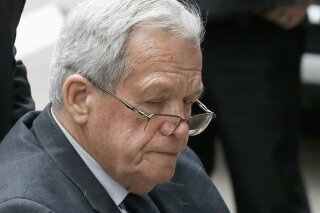 FILE - In this April 27, 2016, file photo, former House Speaker Dennis Hastert leaves the federal courthouse in Chicago. An Illinois judge has determined a former student who was sexually abused by Hastert breached an unwritten $3.5 million hush-money deal with the former U.S. House Speaker by telling family members and a friend about it. (AP Photo/Charles Rex Arbogast, File)