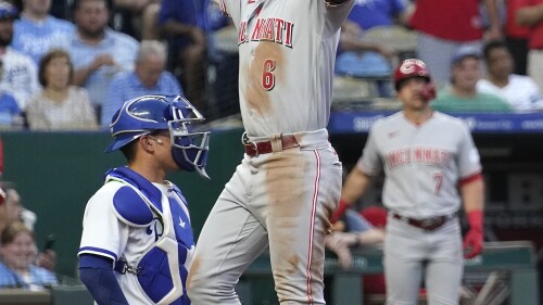 Cincinnati Reds' Jonathan India celebrates as he crosses the plate after hitting a solo home run during the fifth inning of a baseball game against the Kansas City Royals Wednesday, June 14, 2023, in Kansas City, Mo. (AP Photo/Charlie Riedel)