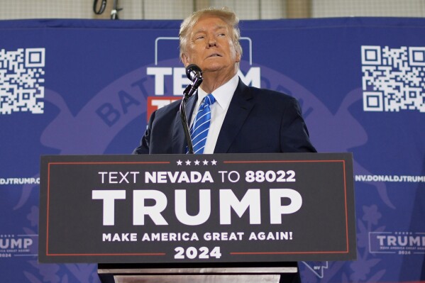 FILE - Republican presidential candidate former President Donald Trump speaks at a campaign event Jan. 27, 2024, in Las Vegas. Even without Donald Trump on Nevada’s Republican ballot, Nikki Haley was still denied her first victory. The indignity of a distant second-place finish behind “none of these candidates” was a blow for Haley facilitated by the staunch Trump allies who lead Nevada’s GOP. They had already maneuvered to ensure Trump has a lock on the state’s 26 delegates, who will be awarded in caucuses on Thursday where he faces only token opposition. (AP Photo/John Locher, File)