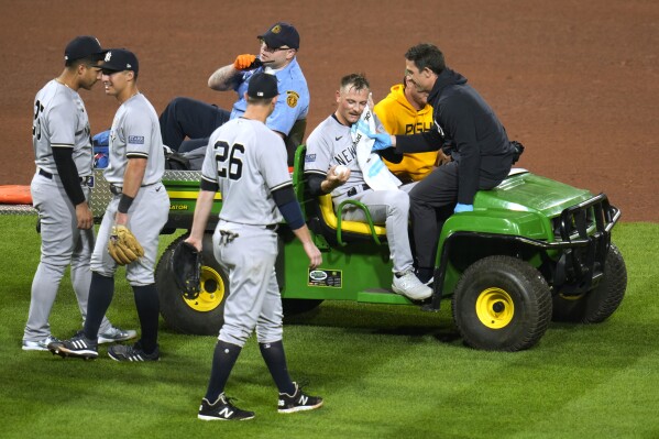 New York Yankees relief pitcher Anthony Misiewicz is taken off the field after being injured during the sixth inning of the team's baseball game against the Pittsburgh Pirates in Pittsburgh, Friday, Sept. 15, 2023. (AP Photo/Gene J. Puskar)