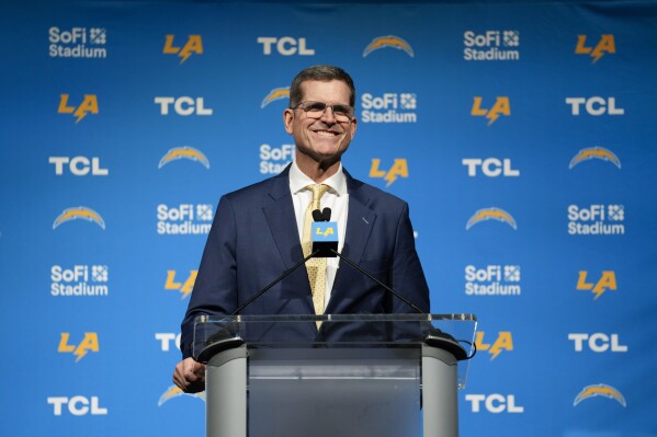 Jim Harbaugh speaks during a press conference introducing him as the new head coach of the Los Angeles Chargers NFL football team, Thursday, Feb. 1, 2024, in Inglewood, Calif. (AP Photo/Ashley Landis)