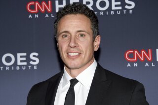 FILE - In this Dec. 8, 2018 file photo, CNN anchor Chris Cuomo attends the 12th annual CNN Heroes: An All-Star Tribute at the American Museum of Natural History in New York.  CNN says it completely supports Cuomo after he was seen on video threatening to push a man down some stairs during a confrontation after the man apparently called him “Fredo,” in a seeming reference to the “Godfather” movies. The video appeared Monday, Aug. 12, 2019 on a conservative YouTube channel. (Photo by Evan Agostini/Invision/AP, File)