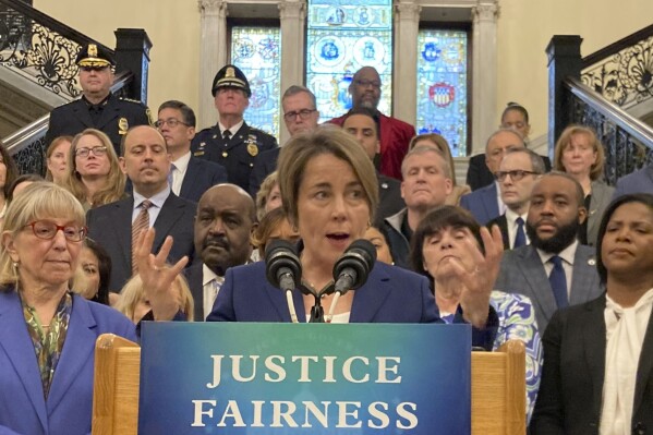 Massachusetts Gov. Maura Healey holds a news conference at the Massachusetts Statehouse in Boston on Wednesday, March 13, 2024. Healey said she would issue pardons for tens of thousands of people convicted of misdemeanor marijuana charges going back decades in the latest example of a state ambitiously seeking to forgive low-level drug offenders. (AP Photo/Steve LeBlanc)