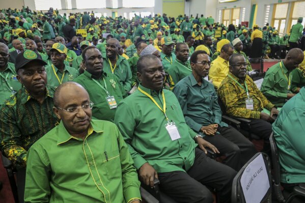 FILE - In this Saturday, July 11, 2020 file photo, party members attend the national congress of the ruling Chama cha Mapinduzi (CCM) party in Dodoma, Tanzania. Tanzanians are due to go to the polls on Wednesday, Oct. 28, 2020 with the future of one of Africa's most populous countries at stake and, at least before the COVID-19 pandemic, one of its fastest-growing economies. (AP Photo, File)