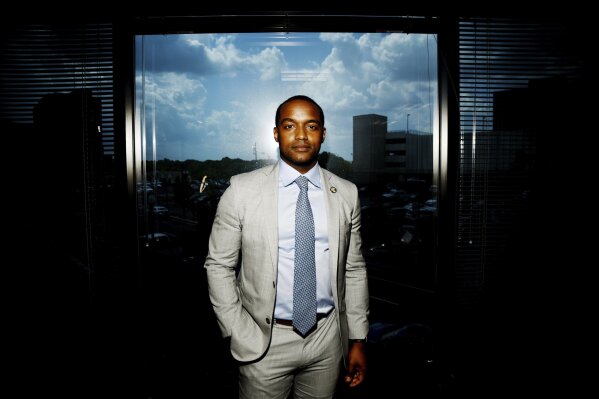 This Aug. 20, 2020 photo shows Shreveport Mayor Adrian Perkins at his office in Shreveport La.  Perkins is entering Louisiana’s U.S. Senate race. He announced Wednesday that he's trying to unseat Republican incumbent Bill Cassidy in a last-minute entrance into the competition as the candidate signup period begins.  (Henrietta Wildsmith/The Shreveport Times via AP)