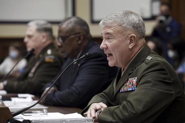 Marine Corps Gen. Kenneth F. McKenzie, commander of U.S. Central Command, testifies before the House Armed Services Committee on the conclusion of military operations in Afghanistan, Wednesday, Sept. 29, 2021, on Capitol Hill in Washington. (Olivier Douliery/Pool via AP)