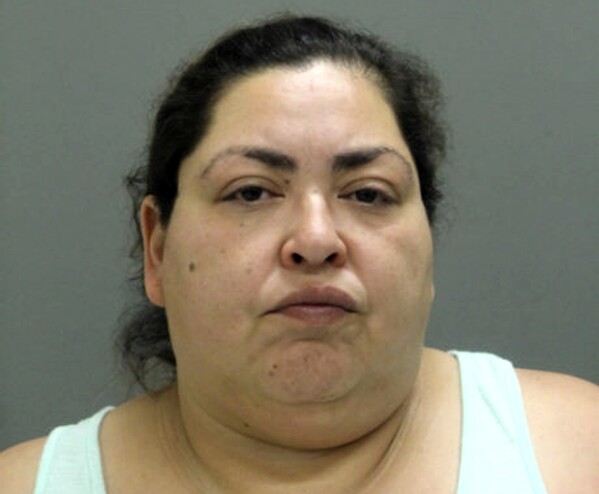 FILE - This booking photo provided by the Chicago Police Department on May 16, 2019, shows Clarisa Figueroa, who is charged in the death of 19-year-old expectant mother Marlen Ochoa-Lopez. Figueroa, a Chicago woman accused of luring the pregnant teenager to her home and cutting her baby from her womb with a butcher knife nearly five years ago, pleaded guilty to murder Tuesday, April 16, 2024, and was sentenced to 50 years in prison. (Chicago Police Department via AP, File)