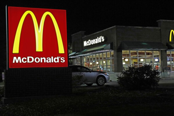 FILE - A McDonald's restaurant is seen, Feb. 14, 2018, in Ridgeland, Miss. McDonald's plans to eliminate self-service soda machines at all of its U.S. restaurants by 2032, the Chicago-based fast food chain has confirmed. In an email to The Associated Press on Tuesday, Sept. 12, 2023, McDonald's USA said the goal of the change is to create consistency for customers and crew members across the chain's offerings — from in-person dining to online delivery and drive-thru options. (AP Photo/Rogelio V. Solis, File)