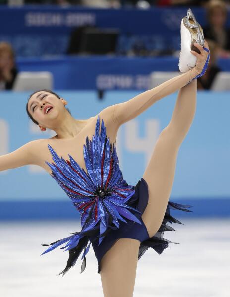Mao Asada of Japan competes in the women's free skate figure skating finals at the Iceberg Skating Palace during the 2014 Winter Olympics, Thursday, Feb. 20, 2014, in Sochi, Russia. (AP Photo/Bernat Armangue)