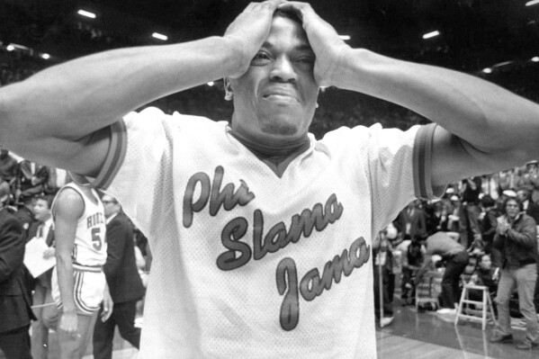 FILE - Houston's Renaldo Thomas holds his head after losing 54-52 to North Carolina State in the championship game of the NCAA college basketball championship game in Albuquerque, N.M., April 4, 1983. (Larry Reese/Houston Chronicle via AP, File)