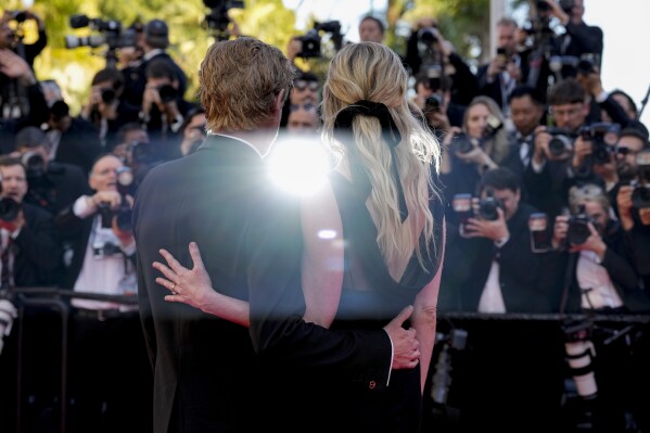 Jesse Plemons, left, and Kirsten Dunst pose for photographers upon arrival at the premiere of the film 'Kinds of Kindness' at the 77th international film festival, Cannes, southern France, Friday, May 17, 2024. (Photo by Andreea Alexandru/Invision/AP)