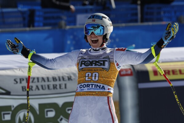 Norway's Ragnhild Mowinckel reacts after winning an alpine ski, women's APCup downhill race, in Cortina d'Ampezzo, Italy, Saturday, Jan. 27, 2024. (APPhoto/Alessandro Trovati)