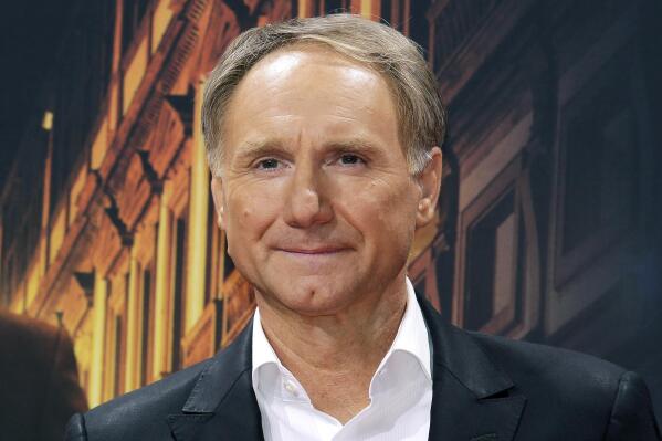 FILE - In this Oct. 10, 2016 file photo, author Dan Brown is seen in Berlin, Germany. The "DaVinci Code" author, a resident of New Hampshire, has settled a lawsuit that was filed by his ex-wife, Blythe Brown, over allegations that he led a secret life during their marriage that included several affairs, according to court papers filed Monday, Dec 27, 2021. (AP Photo/Markus Schreiber, File)