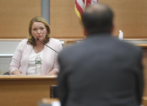 Nicole Hockley, mother of deceased Sandy Hook Elementary student Dylan Hockley, answers questions from lawyer Chris Mattei during her testimony in the Alex Jones defamation trial at Superior Court in Waterbury, Conn. on Tuesday, Sept. 27, 2022. (Brian A. Pounds/Hearst Connecticut Media via AP)