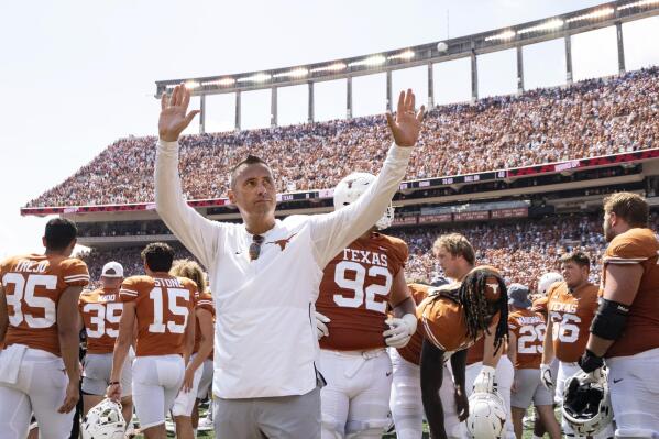 Texas head coach Steve Sarkisian waves to the fans after an NCAA college football game against Alabama, Saturday, Sept. 10, 2022, in Austin, Texas. Alabama won 20-19. (AP Photo/Michael Thomas)