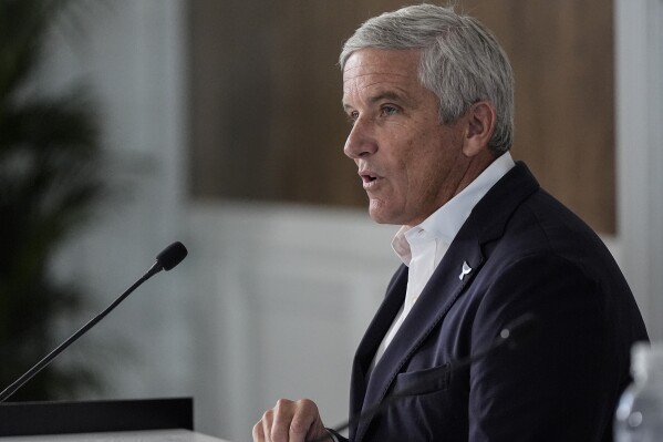 Commissioner of the PGA Tour, Jay Monahan IV speaks during a news conference ahead of the Tour Championship golf tournament, in Atlanta, Aug. 28, 2024. (AP Photo/Mike Stewart, File)