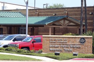 This May 20, 2019 photo shows the Border Patrol Station in Weslaco, Texas. Video has surfaced showing the U.S. Border Patrol cell where a 16-year-old from Guatemala died of the flu shows the teen writhing and collapsing on the floor for hours before he was found dead. The footage published Thursday, Dec. 5, 2019, by ProPublica calls into question the Border Patrol's treatment of Carlos Hernandez Vasquez, who was found dead May 20, 2019. (Joel Martinez/The Monitor via AP)