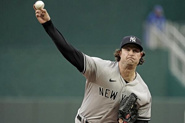 New York Yankees starting pitcher Gerrit Cole throws during the first inning of a baseball game against the Kansas City Royals Saturday, April 30, 2022, in Kansas City, Mo. (AP Photo/Charlie Riedel)