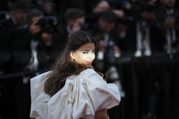 Aishwarya Rai Bachchan poses for photographers upon arrival at the premiere of the film 'Megalopolis' at the 77th international film festival, Cannes, southern France, Thursday, May 16, 2024. (Photo by Daniel Cole/Invision/AP)