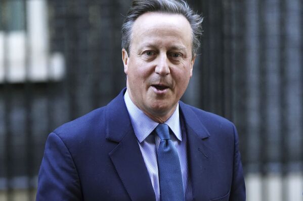 Britain's former prime minister David Cameron leaves Downing Street, in London, Monday, Nov. 13, 2023. British Prime Minister Rishi Sunak on Monday fired Home Secretary Suella Braverman, a divisive figure who drew anger for accusing police of being too lenient with pro-Palestinian protesters. In a highly unusual move, former Prime Minister David Cameron was named foreign secretary. It's rare for a former leader, and a non-lawmaker, to take a senior government post. The government said Cameron will be appointed to Parliament's unelected upper chamber, the House of Lords. (James Manning/PA via AP)