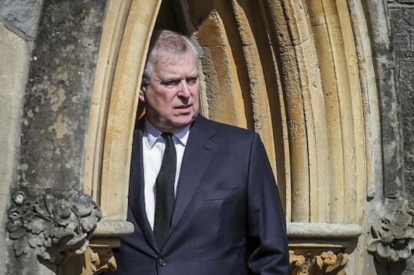 FILE - Britain's Prince Andrew appears at the Royal Chapel at Windsor, following the death announcement of his father Prince Philip, April 11, 2021, in England. Prince Andrew has lost another ceremonial honor as groups throughout Britain cut ties to the royal disgraced by allegations of sexual misconduct. Councilors in the northern city of York on Wednesday night, April 27, 2022 voted unanimously to withdraw the prince’s status as a “freeman of the city.” The honor was awarded to Andrew in 1987 after Queen Elizabeth II made him the Duke of York.  (Steve Parsons/Pool Photo via AP, File)