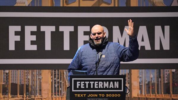 Pennsylvania Lt. Gov. John Fetterman, a Democratic candidate for U.S. Senate, speaks during a campaign event with Dave Matthews in downtown Pittsburgh, Wednesday, Oct. 26, 2022. (AP Photo/Gene J. Puskar)