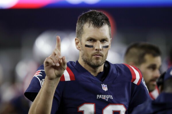 
              New England Patriots quarterback Tom Brady signals on the sideline during the first half of an NFL football game against the Indianapolis Colts, Thursday, Oct. 4, 2018, in Foxborough, Mass. (AP Photo/Charles Krupa)
            