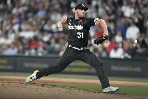 Chicago White Sox relief pitcher Liam Hendriks delivers during the eighth inning of a baseball game against the Los Angeles Angels, Monday, May 29, 2023, in Chicago. (AP Photo/Charles Rex Arbogast)