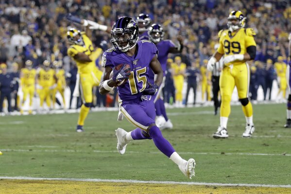 Baltimore Ravens wide receiver Marquise Brown scores against the Los Angeles Rams during the first half of an NFL football game Monday, Nov. 25, 2019, in Los Angeles. (AP Photo/Marcio Jose Sanchez)