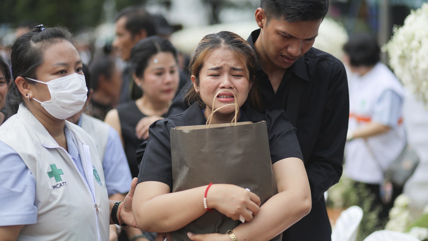 featured image thumbnail for post Small town in Thailand hold mass cremation for 23 who died in a school trip bus fire