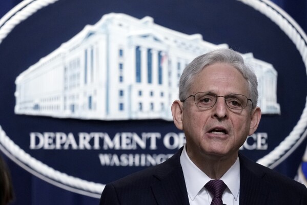 FILE - Attorney General Merrick Garland speaks during a news conference at the Justice Department in Washington, Friday, April 14, 2023. A top assassin for the Sinaloa drug cartel who was arrested by Mexican authorities last fall has been extradited to the U.S. to face drug, gun and witness retaliation charges, the Justice Department said Saturday, May 25, 2024. (AP Photo/Susan Walsh, File)