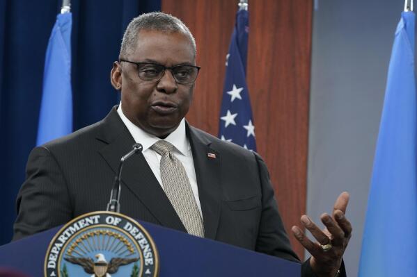 FILE - Defense Secretary Lloyd Austin speaks during a briefing at the Pentagon in Washington, Nov. 16, 2022. Lawyers for a group of Navy SEALS and other Navy personnel who oppose a COVID-19 vaccination requirement on religious grounds want a federal appeals court to keep alive their legal fight against the Biden administration. Congress voted to end the requirement in Dec. 2022, however, vaccine opponents note that commanders can still make decisions on how and whether to deploy unvaccinated troops, under a memo signed last month by Defense Secretary Austin. (AP Photo/Susan Walsh, File)