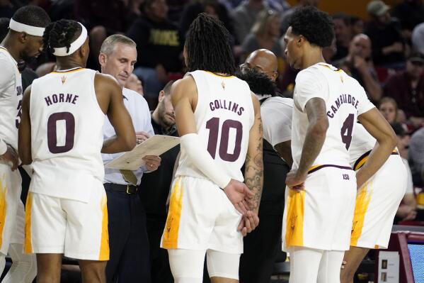 Arizona State's coach Bobby Hurley draws up a play late in the game against Utah during the second half of an NCAA college basketball game, Saturday, Feb. 18, 2023, in Tempe, Ariz. (AP Photo/Darryl Webb)