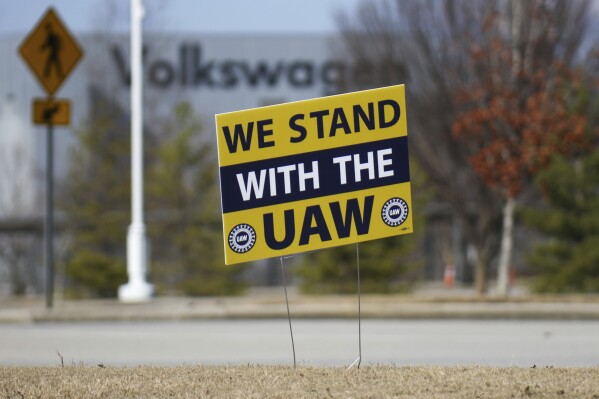 A "We stand with the UAW" sign is placed outside of the Volkswagen plant in Chattanooga, Tenn., on Dec. 18, 2023. Volkswagen’s factory in Chattanooga is likely to be the first test of the United Auto Workers’ effort to organize nonunion automobile plants across the nation. The union said workers at the factory filed paperwork Monday, March 18, 2024 with the National Labor Relations Board seeking a union representation election. (Olivia Ross/Chattanooga Times Free Press via AP, file)