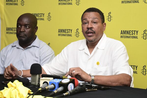 Amnesty Kenya Executive Director, Irungu Houghton, speaks during a press conference in Mombasa, Kenya Tuesday, May 13, 2025. (AP Photo)