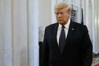 President Donald Trump arrives to speak about the PREVENTS "President's Roadmap to Empower Veterans and End a National Tragedy of Suicide," task force, in the East Room of the White House, Wednesday, June 17, 2020, in Washington. (AP Photo/Alex Brandon)